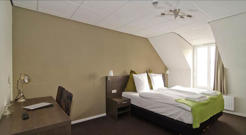 Imagen de la habitación del Hotel Asselt. Foto 15