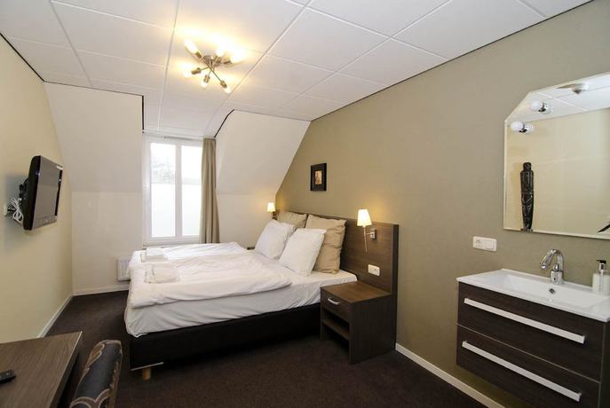 Imagen de la habitación del Hotel Asselt. Foto 17