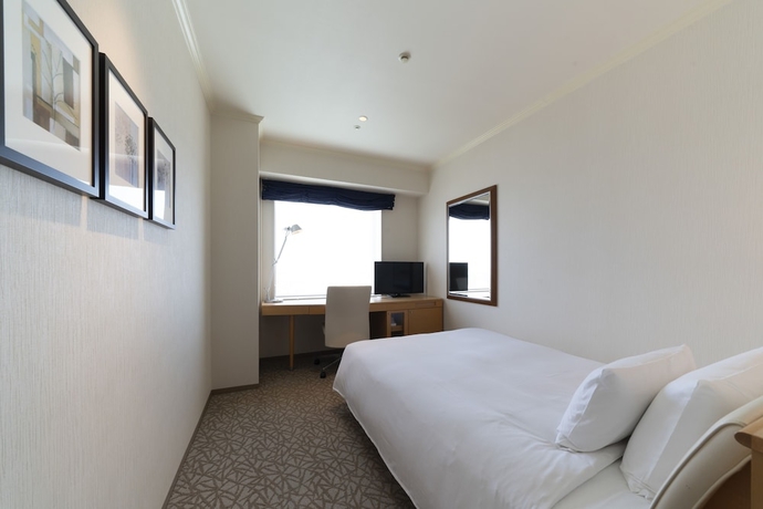 Imagen de la habitación del Hotel Associa Toyohashi. Foto 4