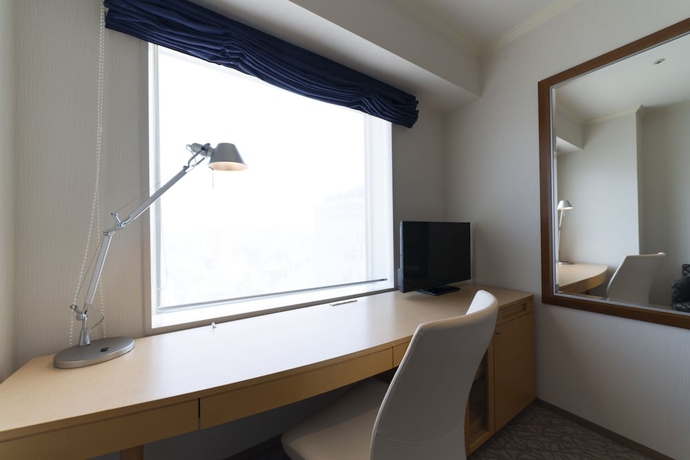 Imagen de la habitación del Hotel Associa Toyohashi. Foto 14
