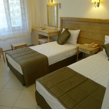 Imagen de la habitación del Hotel Assos Eden Beach. Foto 9