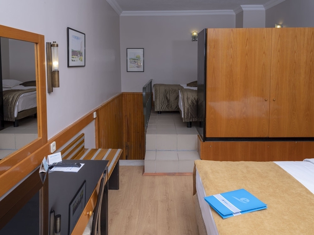 Imagen de la habitación del Hotel Assos Eden Gardens. Foto 14