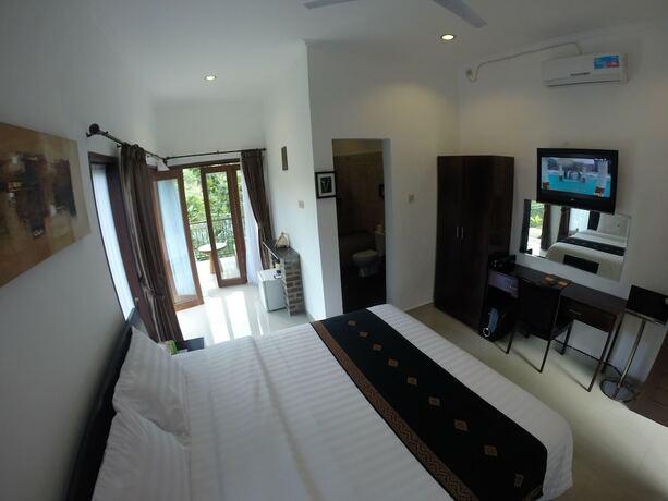 Imagen de la habitación del Hotel Astana Swaha Villa. Foto 31