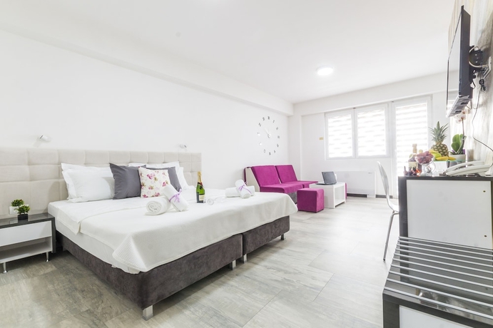 Imagen de la habitación del Hotel Astera Apart. Foto 2