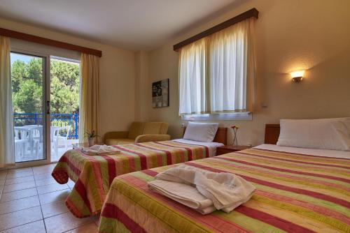 Imagen de la habitación del Hotel Asteras, Sarti. Foto 9