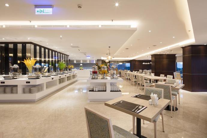 Imagen del bar/restaurante del Hotel Asteria Comodo Nha Trang. Foto 4