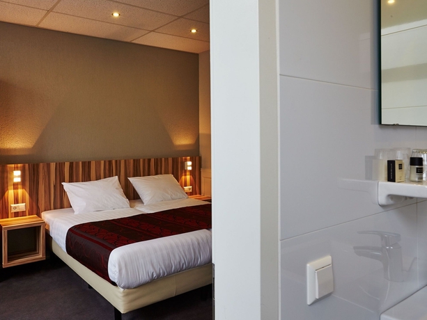 Imagen de la habitación del Hotel Asterisk Hotel. Foto 11