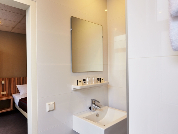 Imagen de la habitación del Hotel Asterisk Hotel. Foto 12