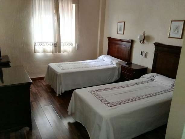 Imagen de la habitación del Hotel Astigi. Foto 15