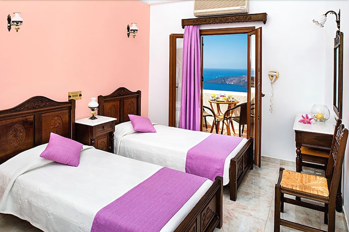 Imagen de la habitación del Hotel Astir Thira. Foto 12