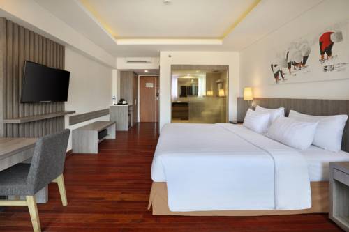 Imagen de la habitación del Hotel Aston Canggu Beach Resort. Foto 6