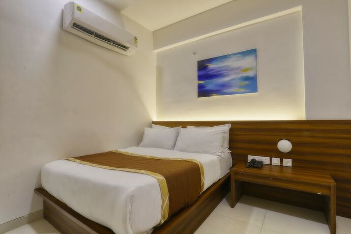 Imagen de la habitación del Hotel Aston, Indore. Foto 15