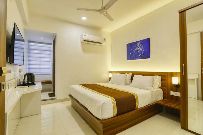 Imagen de la habitación del Hotel Aston, Indore. Foto 16
