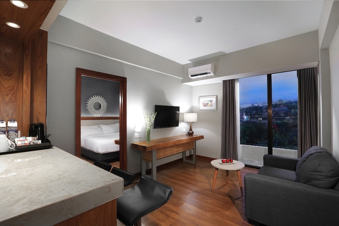 Imagen de la habitación del Hotel Aston Inn Batu. Foto 2