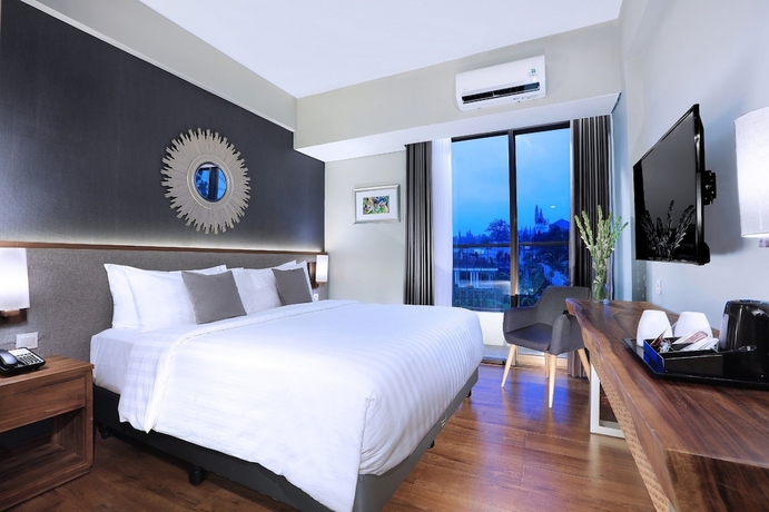 Imagen de la habitación del Hotel Aston Inn Batu. Foto 8