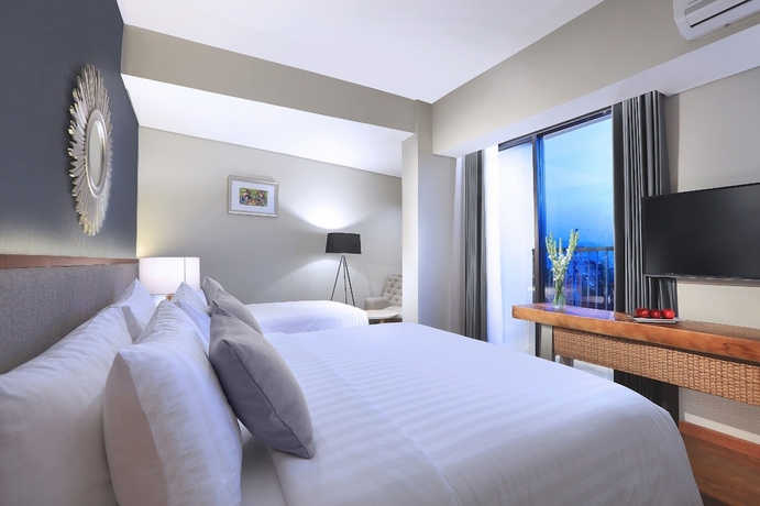 Imagen de la habitación del Hotel Aston Inn Batu. Foto 14