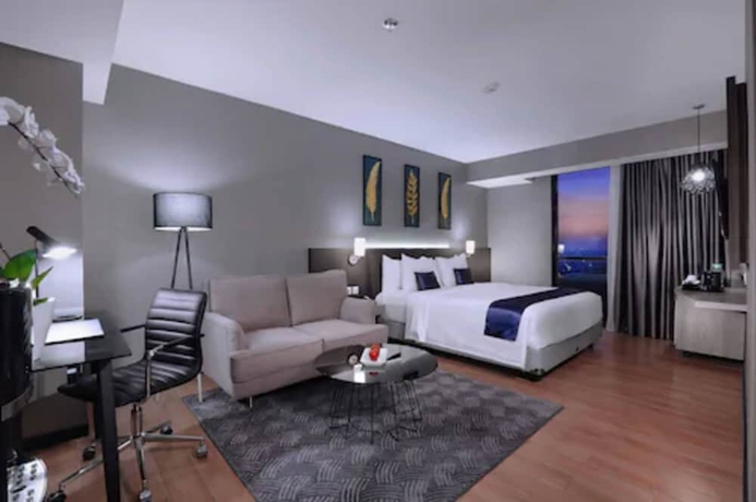 Imagen de la habitación del Hotel Aston Inn Pandanaran - Semarang. Foto 7