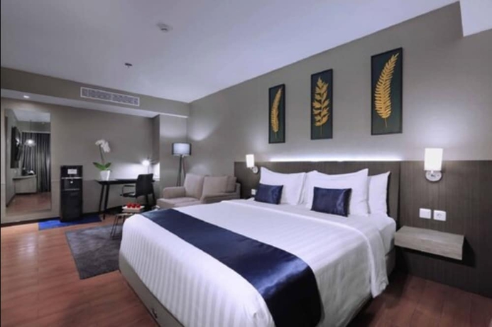 Imagen de la habitación del Hotel Aston Inn Pandanaran - Semarang. Foto 9
