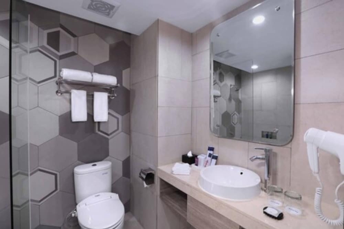 Imagen de la habitación del Hotel Aston Inn Pandanaran - Semarang. Foto 10
