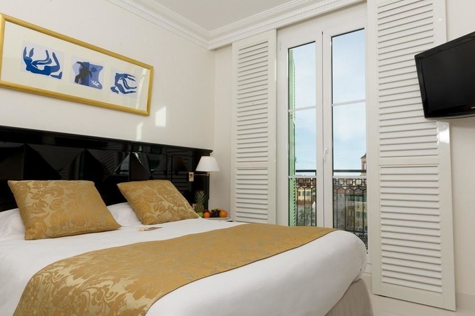 Imagen de la habitación del Hotel Aston La Scala. Foto 2