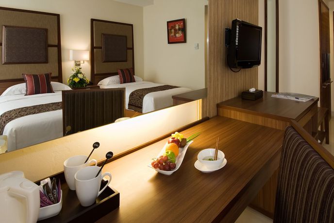Imagen de la habitación del Hotel Aston Manado. Foto 11
