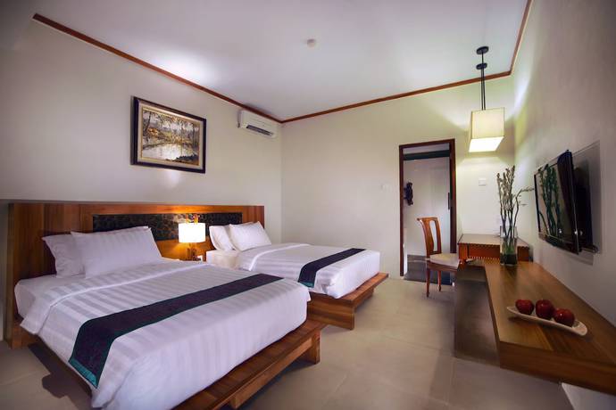 Imagen de la habitación del Hotel Aston Sunset Beach Resort - Gili Trawangan. Foto 8