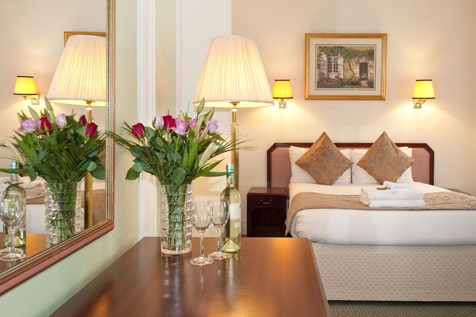 Imagen de la habitación del Hotel Astor Court. Foto 9