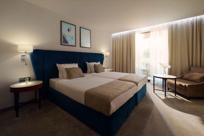 Imagen de la habitación del Hotel Astor Garden. Foto 7