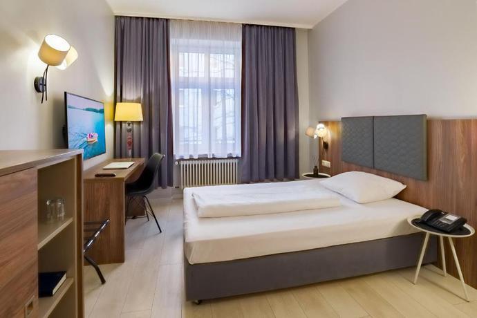 Imagen de la habitación del Hotel Astor Munich. Foto 1