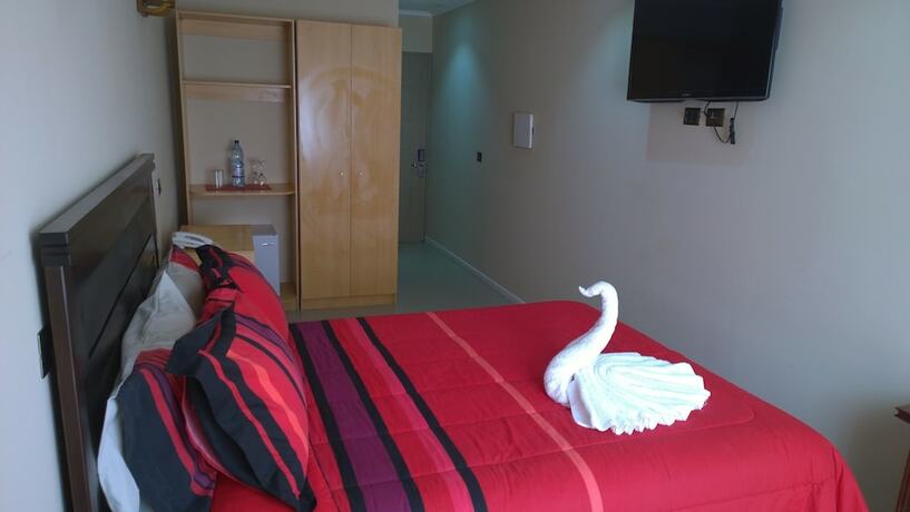 Imagen de la habitación del Hotel Astore Suites. Foto 19