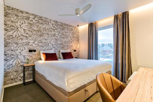 Imagen de la habitación del Hotel Astoria Gent. Foto 10