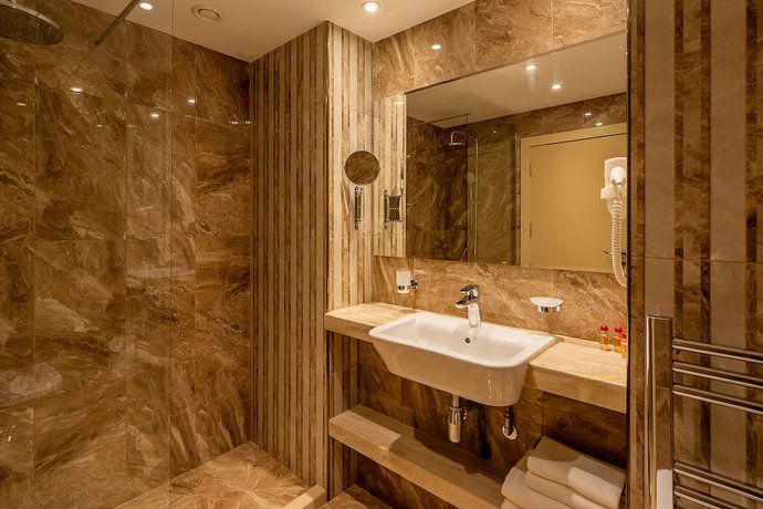 Imagen de la habitación del Hotel Astoria Grand Hotel. Foto 11