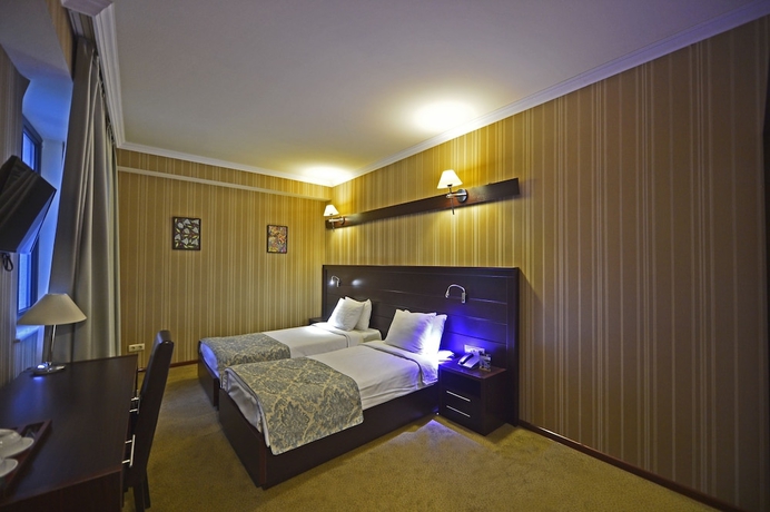 Imagen de la habitación del Hotel Astoria Tbilisi. Foto 7