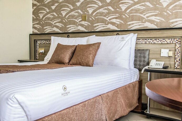 Imagen de la habitación del Hotel Astorian Grand Hotel. Foto 15