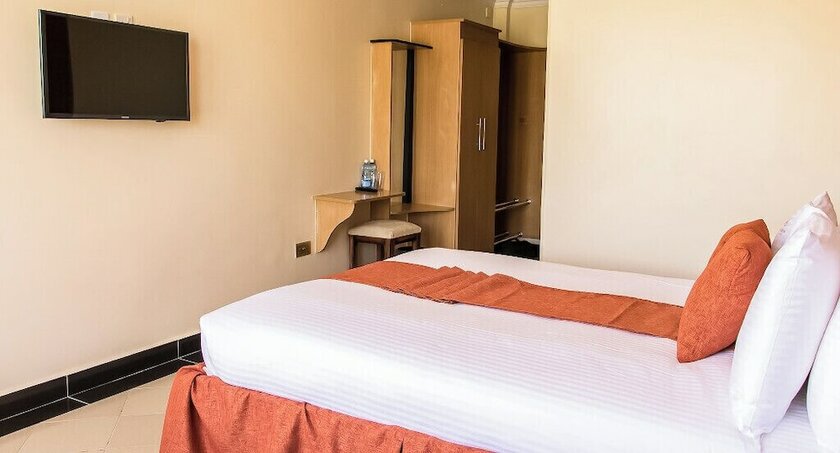 Imagen de la habitación del Hotel Astorian Grand Hotel. Foto 16