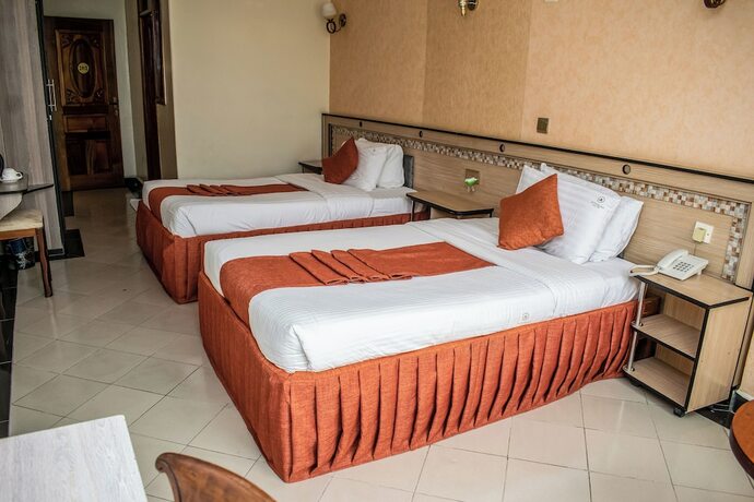 Imagen de la habitación del Hotel Astorian Grand Hotel. Foto 17