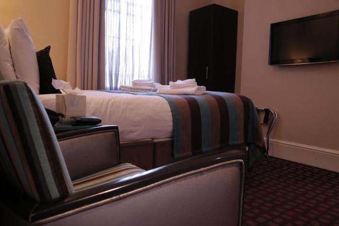 Imagen de la habitación del Hotel Astors Belgravia. Foto 5