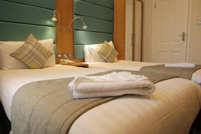 Imagen de la habitación del Hotel Astors Belgravia. Foto 8