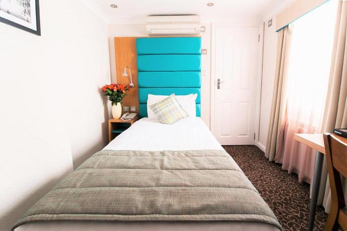 Imagen de la habitación del Hotel Astors Belgravia. Foto 10