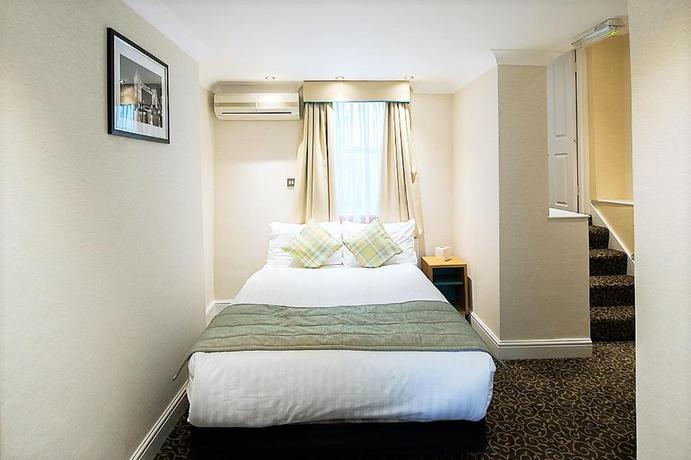 Imagen de la habitación del Hotel Astors Belgravia. Foto 11