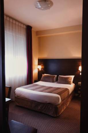 Imagen de la habitación del Hotel Astrid, Caen. Foto 8