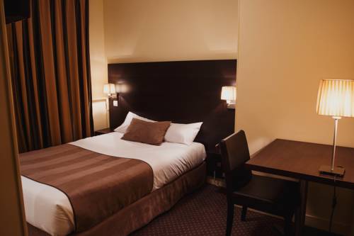 Imagen de la habitación del Hotel Astrid, Caen. Foto 14