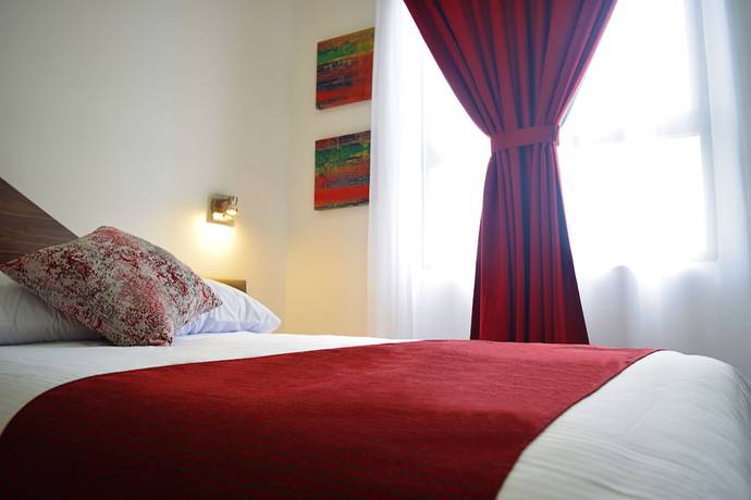 Imagen de la habitación del Hotel Astro Inn Express. Foto 9