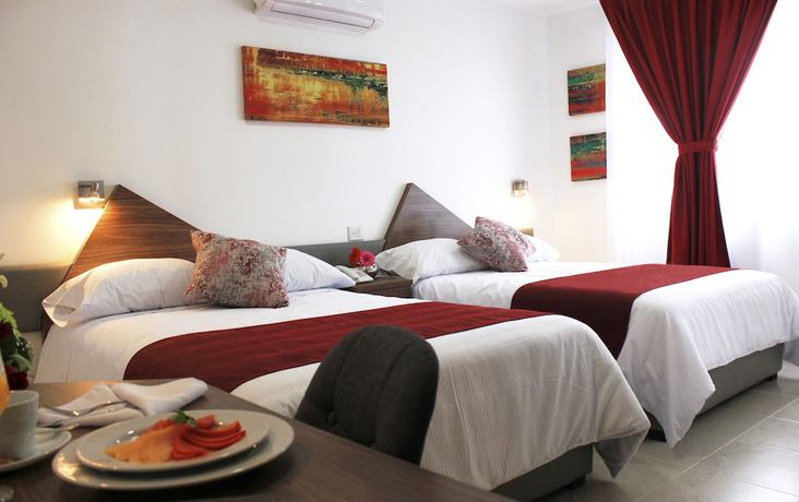 Imagen de la habitación del Hotel Astro Inn Express. Foto 13