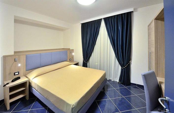 Imagen de la habitación del Hotel Astro Suite. Foto 7