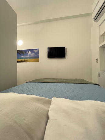 Imagen de la habitación del Hotel Asturias Mall Suites. Foto 13
