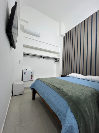 Imagen de la habitación del Hotel Asturias Mall Suites. Foto 15