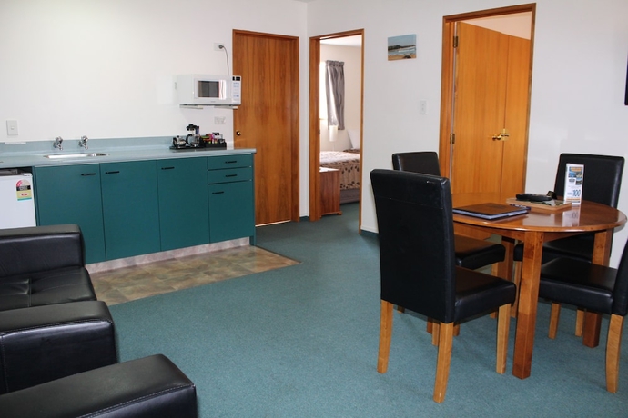 Imagen de la habitación del Hotel Asure Ambassador Motor Lodge. Foto 10