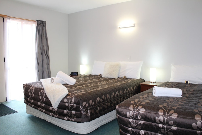 Imagen de la habitación del Hotel Asure Ambassador Motor Lodge. Foto 12