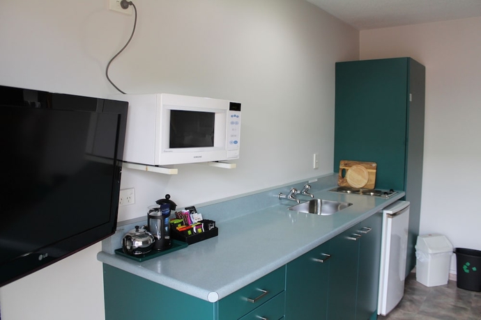 Imagen de la habitación del Hotel Asure Ambassador Motor Lodge. Foto 16